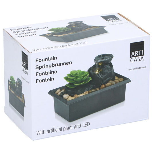 Fountain With Artificial Plant